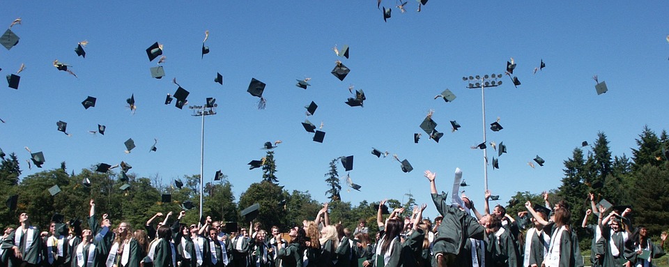 Students celebrating their graduation day before going out and searching for that first job